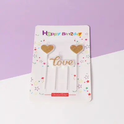 Gold glitter heart candles